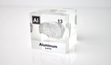 Clear acrylic cube displaying an Aluminum ampule with its atomic number 13. Perfect for educational settings, scientific collections, or as a unique decorative piece.