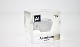 Clear acrylic cube displaying an Aluminum ampule with its atomic number 13. Perfect for educational settings, scientific collections, or as a unique decorative piece.