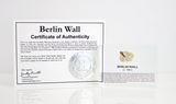 Clear acrylic display case featuring a historical fragment of the Berlin Wall, providing an authentic and educational presentation for history enthusiasts and collectors.