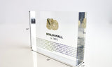 Clear acrylic display case featuring a historical fragment of the Berlin Wall, providing an authentic and educational presentation for history enthusiasts and collectors.