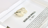 Clear acrylic display case featuring a historical fragment of the Berlin Wall, providing an authentic and educational presentation for history enthusiasts and collectors.