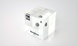 Clear acrylic cube encasing a Beryllium ampule with its atomic number 4. Ideal for display in educational settings, scientific collections, or as a decorative piece.