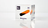 Clear acrylic cube displaying a Bromine element (Atomic Number 35) embedded within, offering a scientific presentation for collectors and science enthusiasts.