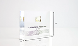 Clear acrylic display case featuring a historical fragment of a Chernobyl medic box, offering an educational presentation for collectors and those interested in nuclear history.