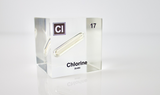 Clear acrylic cube displaying a Chlorine element (Atomic Number 17) embedded within, offering a scientific presentation for collectors and science enthusiasts.