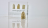 Clear acrylic display case featuring historical Civil War bullets, offering an educational presentation for collectors and enthusiasts of American history.