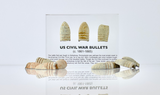 Clear acrylic display case featuring historical Civil War bullets, offering an educational presentation for collectors and enthusiasts of American history.