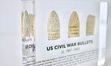 Clear acrylic display case featuring historical Civil War bullets, offering an educational presentation for collectors and enthusiasts of American history.