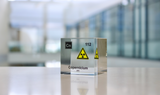Clear acrylic cube displaying a Copernicium element (Atomic Number 112) embedded within, offering a scientific presentation for collectors and science enthusiasts.