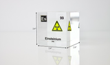 Clear acrylic cube displaying an Einsteinium element (Atomic Number 99) embedded within, offering a scientific presentation for collectors and science enthusiasts.