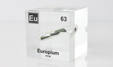 Clear acrylic cube displaying an Europium element (Atomic Number 63) embedded within, offering a scientific presentation for collectors and science enthusiasts.