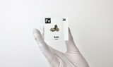 Iron element encased in a clear acrylic cube, featuring its name, atomic number, and key properties from the periodic table. A striking and educational display for science enthusiasts and collectors
