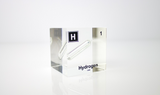 Clear acrylic cube displaying a Hydrogen element (Atomic Number 1) embedded within, offering a scientific presentation for collectors and science enthusiasts.