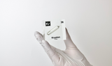 Clear acrylic cube displaying a Krypton element (Atomic Number 36) embedded within, offering a scientific presentation for collectors and science enthusiasts.