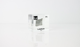 Clear acrylic cube displaying a Lutetium element (Atomic Number 71) embedded within, offering a scientific presentation for collectors and science enthusiasts.