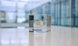 Clear acrylic cube featuring a Magnesium ampule with its atomic number 12. Ideal for educational displays, scientific collections, or as a distinctive decorative item.