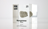 Manganese element in a clear acrylic cube, showcasing its name, atomic number, and properties as displayed on the periodic table. A stylish and informative piece for collectors and educators.