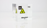 Clear acrylic cube displaying a Nihonium element (Atomic Number 113) embedded within, offering a scientific presentation for collectors and science enthusiasts.