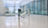 Clear acrylic cube encasing a Nitrogen ampule with its atomic number 7. Ideal for display in educational settings, scientific collections, or as a decorative piece.