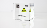 Clear acrylic cube displaying an Oganesson element (Atomic Number 118) embedded within, offering a scientific presentation for collectors and science enthusiasts.