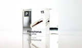 Clear acrylic cube displaying a Phosphorus element (Atomic Number 15) embedded within, offering a scientific presentation for collectors and science enthusiasts.