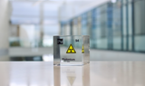 Clear acrylic cube displaying a Plutonium element (Atomic Number 94) embedded within, offering a scientific presentation for collectors and science enthusiasts.