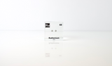 Clear acrylic cube displaying a Ruthenium element (Atomic Number 44) embedded within, offering a scientific presentation for collectors and science enthusiasts.