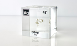 Clear acrylic cube displaying a Silver element (Atomic Number 47) embedded within, offering a scientific presentation for collectors and science enthusiasts.
