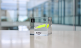 Clear acrylic cube displaying a Sulfur element (Atomic Number 16) embedded within, offering a scientific presentation for collectors and science enthusiasts.