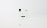 Clear acrylic cube displaying a Thallium element (Atomic Number 81) embedded within, offering a scientific presentation for collectors and science enthusiasts.