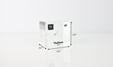 Clear acrylic cube displaying a Thallium element (Atomic Number 81) embedded within, offering a scientific presentation for collectors and science enthusiasts.