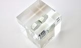 Zinc element encased in a clear acrylic cube, featuring its name, atomic number 30, and properties as displayed on the periodic table. Ideal for educational and collector use.