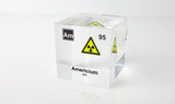 Clear acrylic cube displaying an Americium element (Atomic Number 95) embedded within, offering a scientific presentation for collectors and science enthusiasts. Radiation symbol.