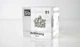 Clear acrylic cube displaying an Antimony element (Atomic Number 51) embedded within, offering a scientific presentation for collectors and science enthusiasts.