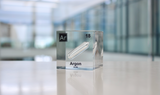 Clear acrylic cube displaying an Argon element (Atomic Number 18) embedded within, offering a scientific presentation for collectors and science enthusiasts.