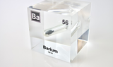 Clear acrylic cube displaying a Barium element (Atomic Number 56) embedded within, offering a scientific presentation for collectors and science enthusiasts.