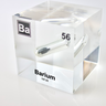 Clear acrylic cube displaying a Barium element (Atomic Number 56) embedded within, offering a scientific presentation for collectors and science enthusiasts.