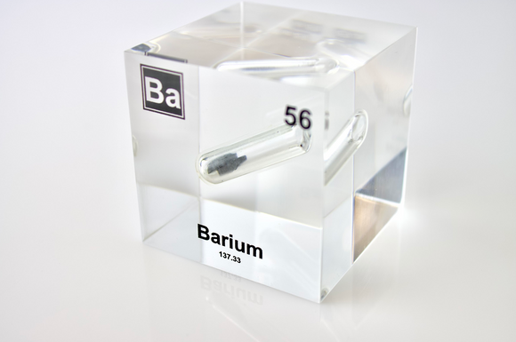 Clear acrylic cube displaying a Barium element (Atomic Number 56) embedded within, offering a scientific presentation for collectors and science enthusiasts.