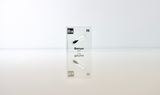 Clear acrylic cube displaying a Barium element (Atomic Number 56) embedded within, offering a scientific presentation for collectors and science enthusiasts.