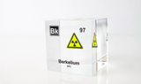 Clear acrylic cube displaying a Berkelium element (Atomic Number 97) embedded within, offering a scientific presentation for collectors and science enthusiasts. Radiation symbol.