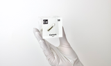 Clear acrylic cube displaying a Cerium element (Atomic Number 58) embedded within, offering a scientific presentation for collectors and science enthusiasts.