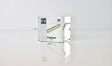 Clear acrylic cube displaying a Cesium element (Atomic Number 55) embedded within, offering a scientific presentation for collectors and science enthusiasts.