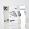 Chromium enclosed in a clear acrylic cube, highlighting its name, atomic number 24, and key properties from the periodic table. A great educational tool and collector’s piece.