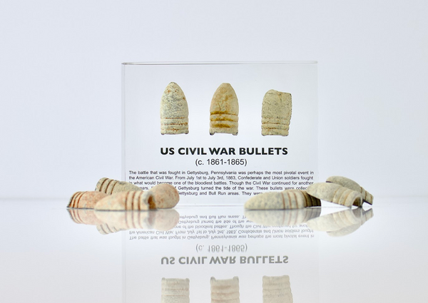 Clear acrylic display case featuring historical Civil War bullets, offering an educational presentation for collectors and enthusiasts of American history.