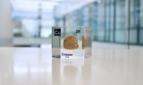 Clear acrylic cube showcasing the Copper element, including its name, atomic number 29, and properties as featured on the periodic table. Ideal for educational displays and collectors.