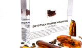 Clear acrylic display case featuring fragments of Egyptian mummy wrappings, offering a historical and educational presentation for collectors and those interested in ancient history.