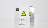 Clear acrylic cube displaying a Flerovium element (Atomic Number 114) embedded within, offering a scientific presentation for collectors and science enthusiasts.