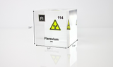 Clear acrylic cube displaying a Flerovium element (Atomic Number 114) embedded within, offering a scientific presentation for collectors and science enthusiasts.