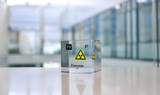 Clear acrylic cube displaying a Francium element (Atomic Number 87) embedded within, offering a scientific presentation for collectors and science enthusiasts.