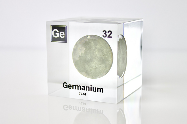 Clear acrylic cube displaying Germanium element with its name, atomic number 32, and periodic table properties. Perfect for educational purposes and collectors.